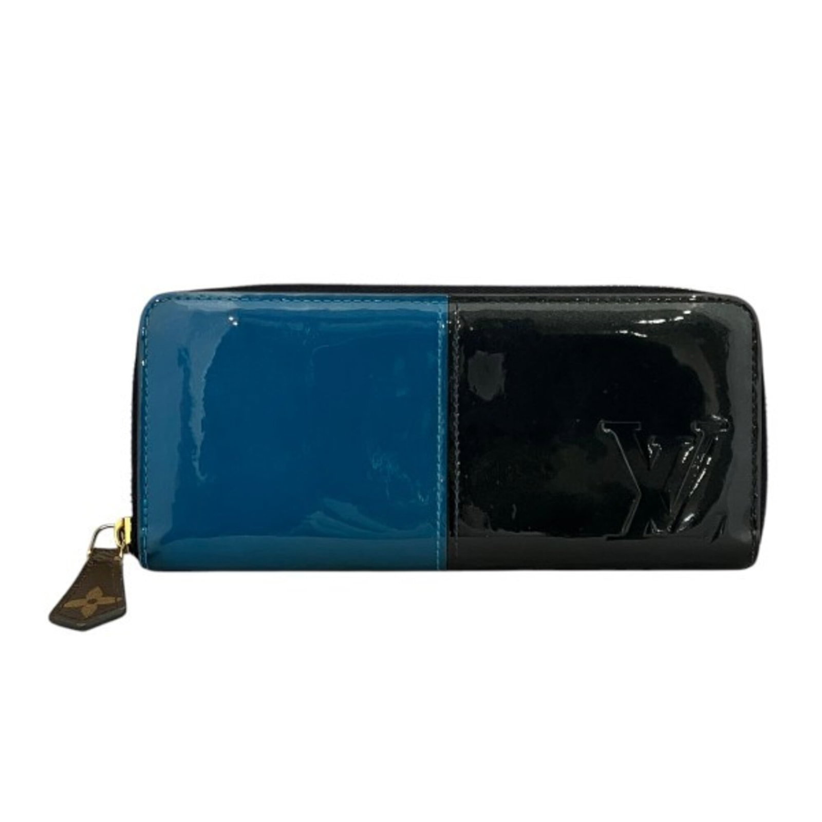 Coin purse vernis coin case Louis Vuitton: Coin purse vernis coin case Louis Vuitton Navy blue vernis coin case from Louis Vuitton features a classic design with a signature. Made of high-quality materials, this coin purse measures 8.5cm x 19.