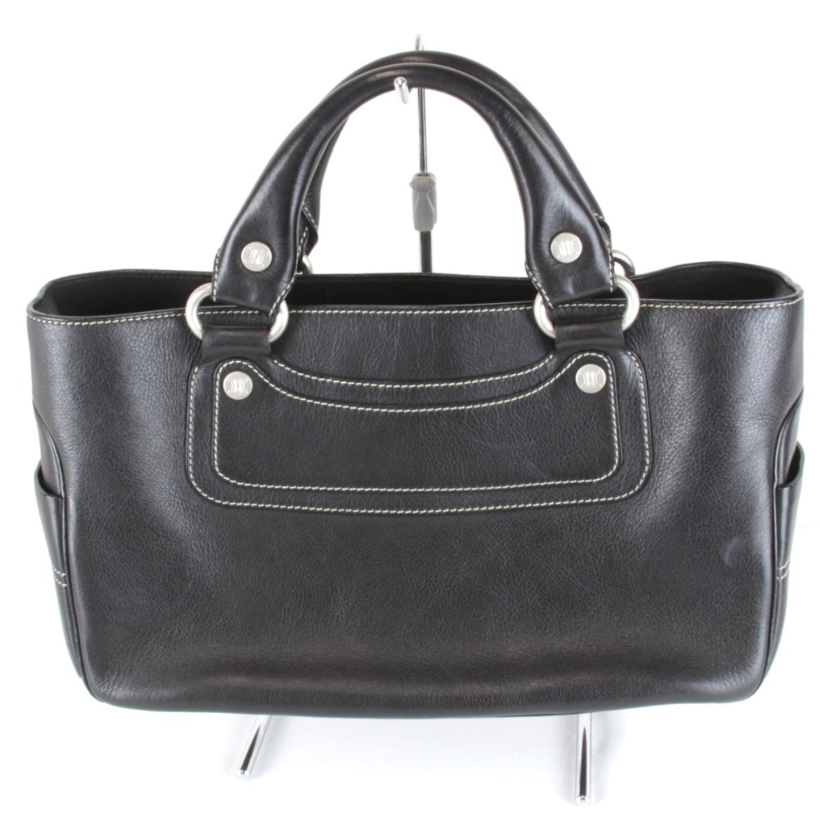 Handbag Leather Celine: Handbag Leather Celine Black Celine leather handbag with dimensions 18cm x 34cm x 12cm. This sleek and stylish bag features high-quality leather construction, a classic design that exudes sophisticati