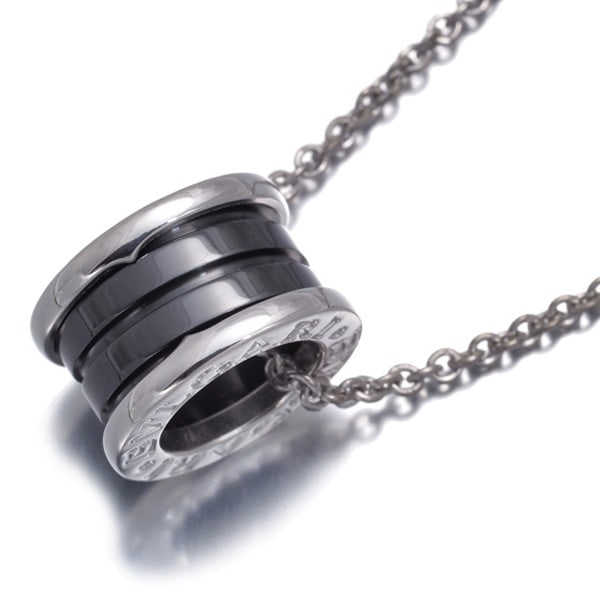 Bvlgari Necklace Save The Children 925 Sterling Silver/ Ceramic: Bvlgari Necklace Save The Children 925 Sterling Silver/ Ceramic 925 Sterling Silver and Ceramic Bvlgari Necklace, part of the Save the Children collection. This elegant pendant necklace features a ste