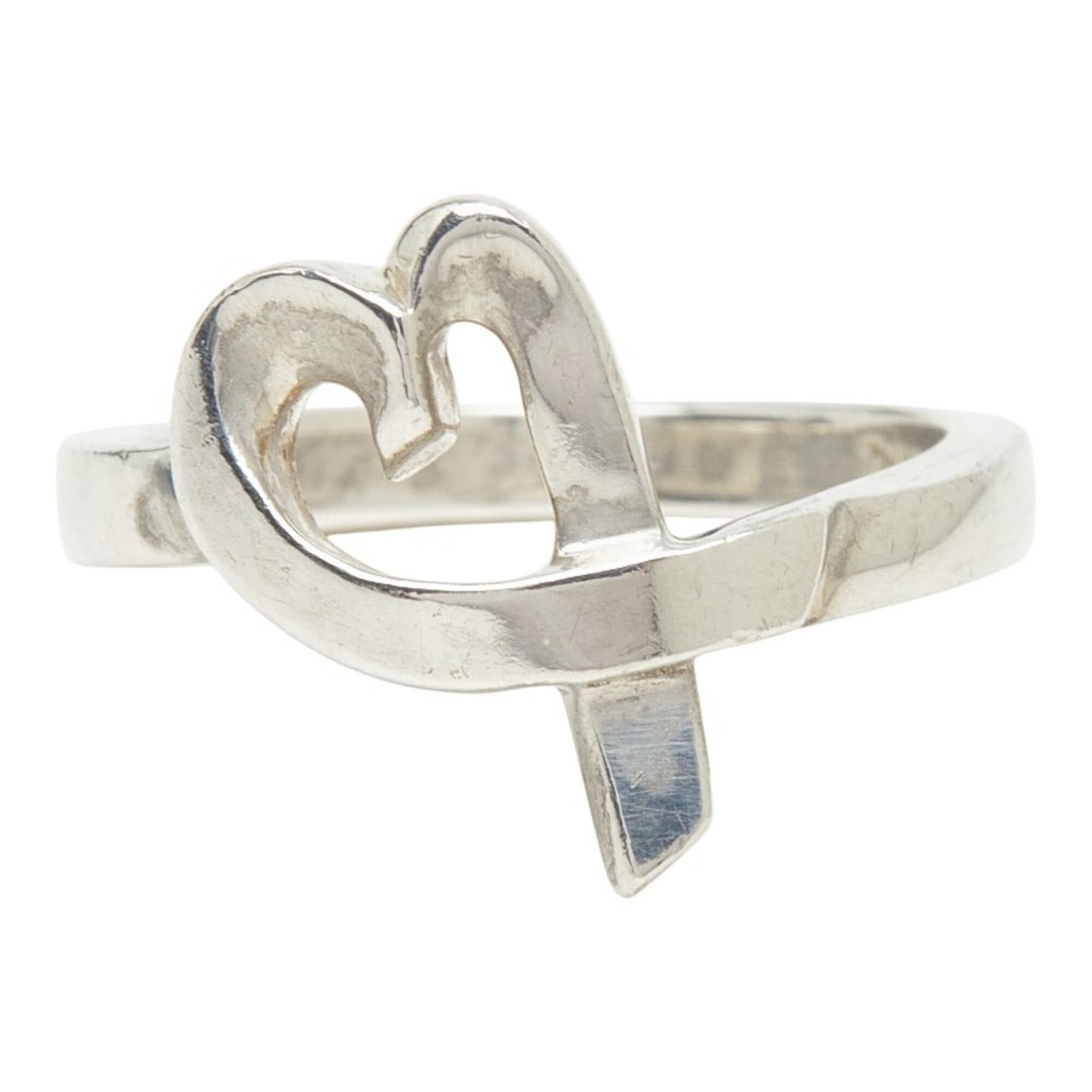 Tiffany Band Ring Silver 925: Tiffany Band Ring Silver 925 Silver 925 band ring from Tiffany, available in US size 6. This elegant piece features high-quality sterling silver construction, making it a timeless accessory for everyd
