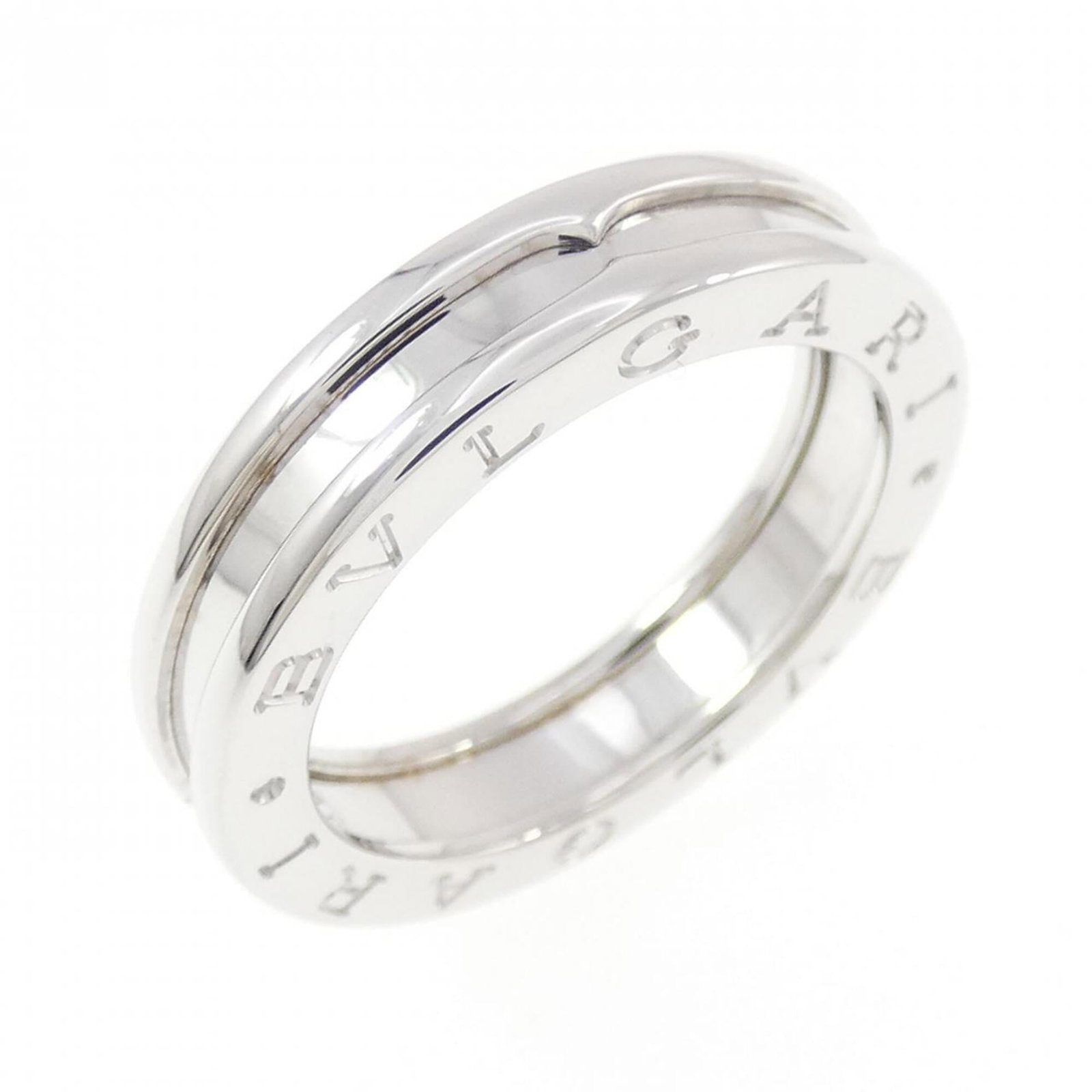 White Gold Bvlgari Ring Band: White Gold Bvlgari Ring Band White gold (18K) band ring from Bvlgari's B.zero1 line, available in US size 8. This elegant ring features a high-quality white gold construction that adds a touch of soph