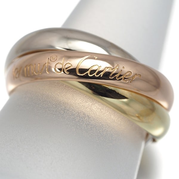 Yellow White Rose Gold Classic Eu50 3Color 18K Cartier Ring Trinity: Yellow White Rose Gold Classic Eu50 3Color 18K Cartier Ring Trinity The Cartier Trinity ring boasts a striking multi-tone gold design, featuring 18k yellow, white, and rose gold accents in a classic E