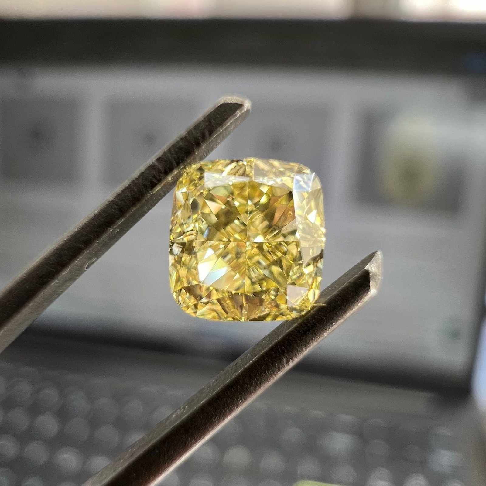 GIA Cushion Modified 0.6ct Fancy Yellow VVS2 - Loose Natural Diamond: GIA Cushion Modified 0.6ct Fancy Yellow VVS2 - Loose Natural Diamond GIA certified, this 0.6ct Fancy Yellow VVS2 diamond boasts exceptional clarity and color, making it a standout in its class. Its