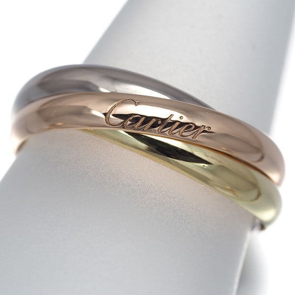 Cartier Ring Trinity 3Color Sm Eu54 18K 750 Yellow White Rose Gold: Cartier Ring Trinity 3Color Sm Eu54 18K 750 Yellow White Rose Gold Cartier's Trinity Ring stands out with its striking multi-tone gold design, featuring 18k yellow, white, and rose gold. This elegant 