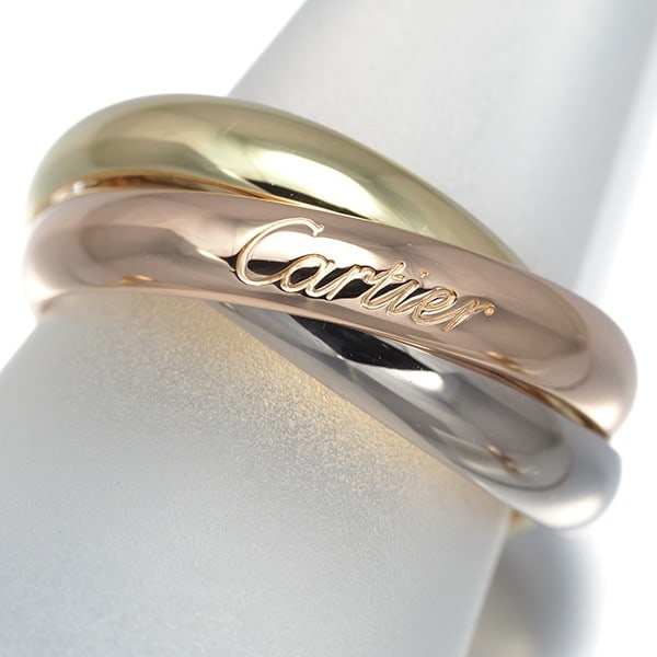 Cartier Ring Trinity 3Color Classic Eu53 18K 750 Yellow White Rose Gold: Cartier Ring Trinity 3Color Classic Eu53 18K 750 Yellow White Rose Gold Cartier's iconic Trinity ring, a masterful blend of three-tone gold, features a sleek design with a subtle rose gold, white gold