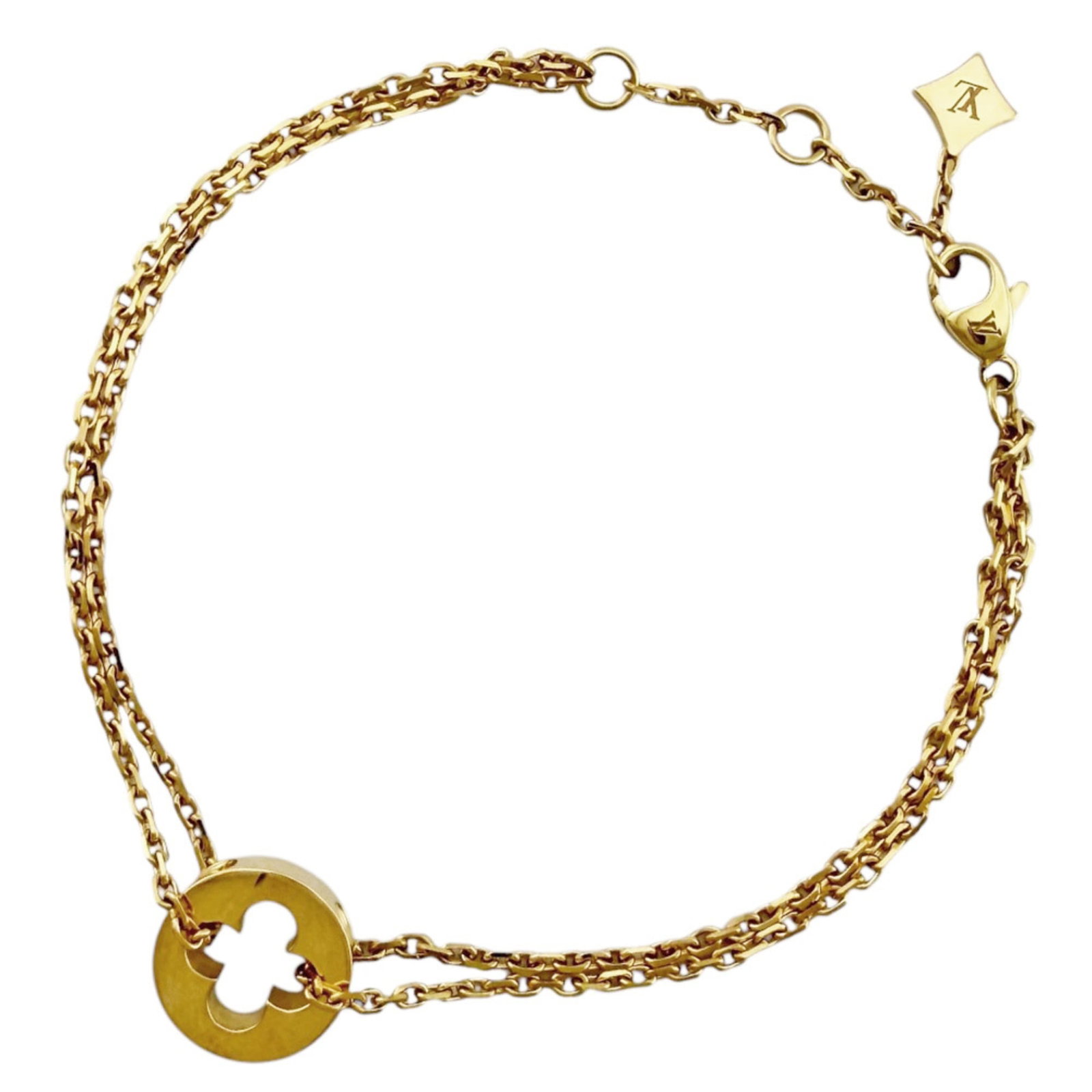 Louis Vuitton Charm Bracelet Yellow Gold (18K): Louis Vuitton Charm Bracelet Yellow Gold (18K) Yellow gold (18K) charm bracelet from Louis Vuitton's Empreinte line, featuring a chain design with no additional charms. Handmade in France, this 18.5cm