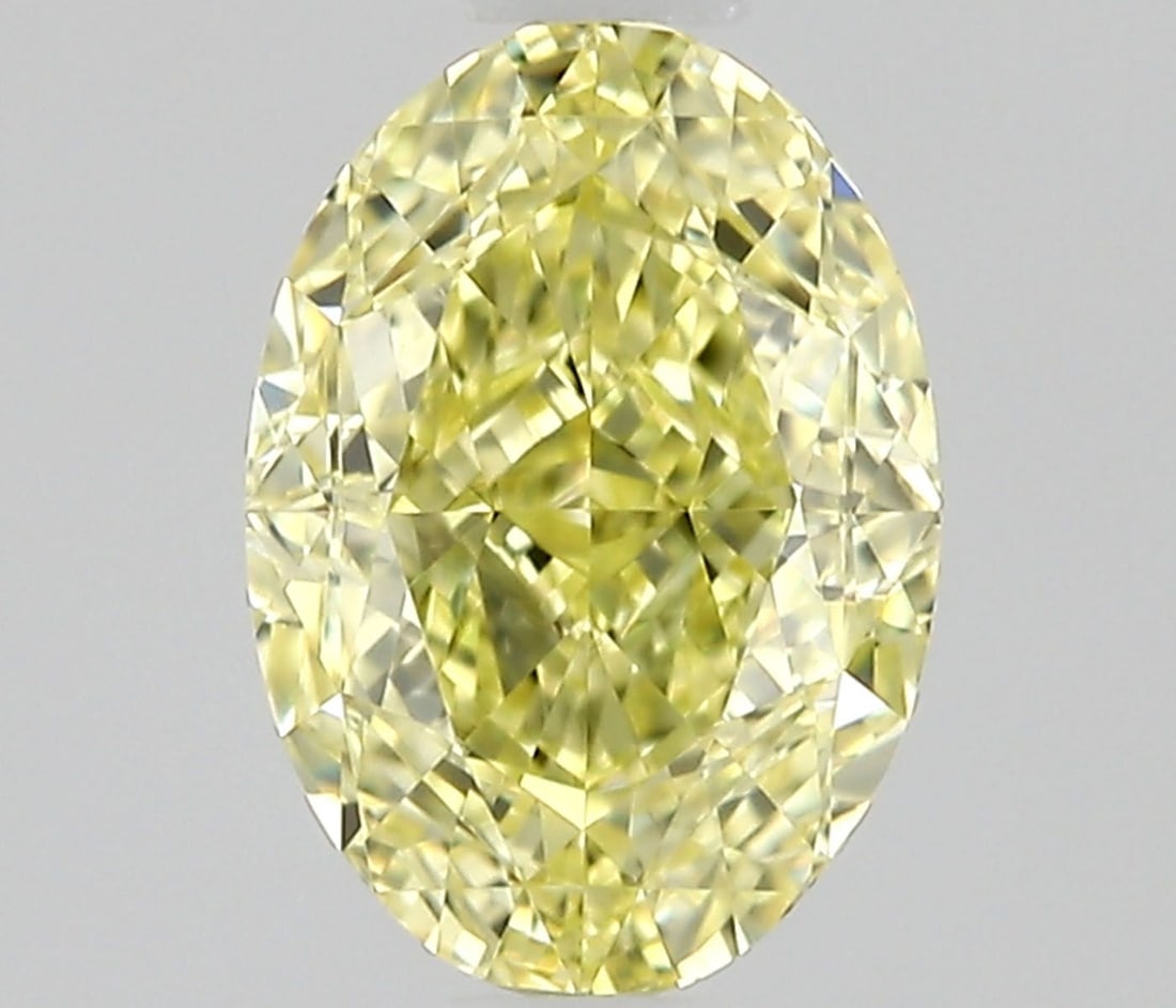 GIA Oval 0.74ct Fancy Intense Yellow VVS1 - Loose Natural Diamond: GIA Oval 0.74ct Fancy Intense Yellow VVS1 - Loose Natural Diamond GIA Oval Cut Diamond with Exceptional Color and Clarity. This 0.74ct Fancy Intense Yellow VVS1 diamond boasts an EX polish finish and 