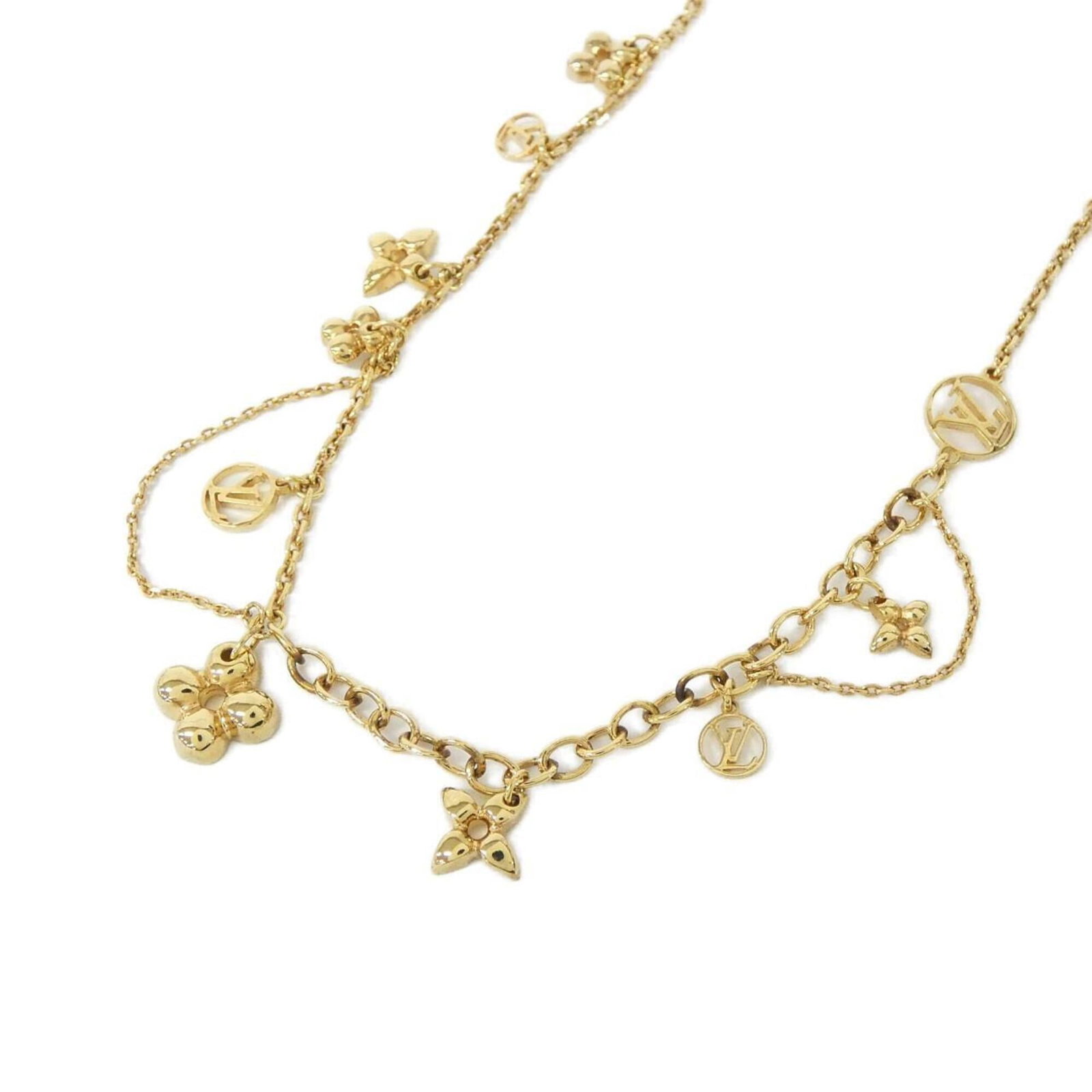 Blooming Necklace Louis Vuitton M64855: Blooming Necklace Louis Vuitton M64855 The Louis Vuitton M64855 Blooming Necklace boasts a striking gold design, featuring a delicate pendant with intricate details. Measuring 13mm x 12mm, the