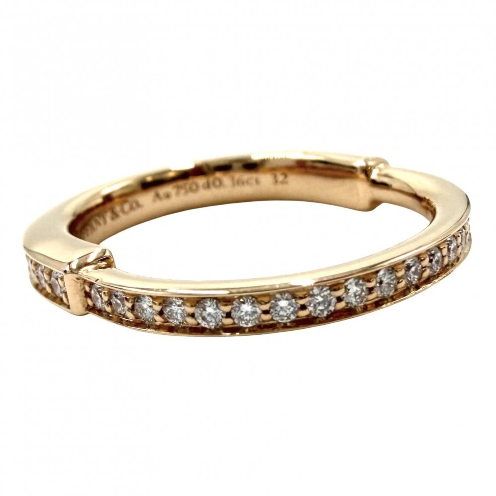 Pink Gold Tiffany Ring Band: Pink Gold Tiffany Ring Band Pink gold (18K) Tiffany ring band features a diamond weighing 0.36 carats, set in a sturdy design with a US size of 4.5 and width of 2mm. The band's weight is 3.8g / 0.13oz