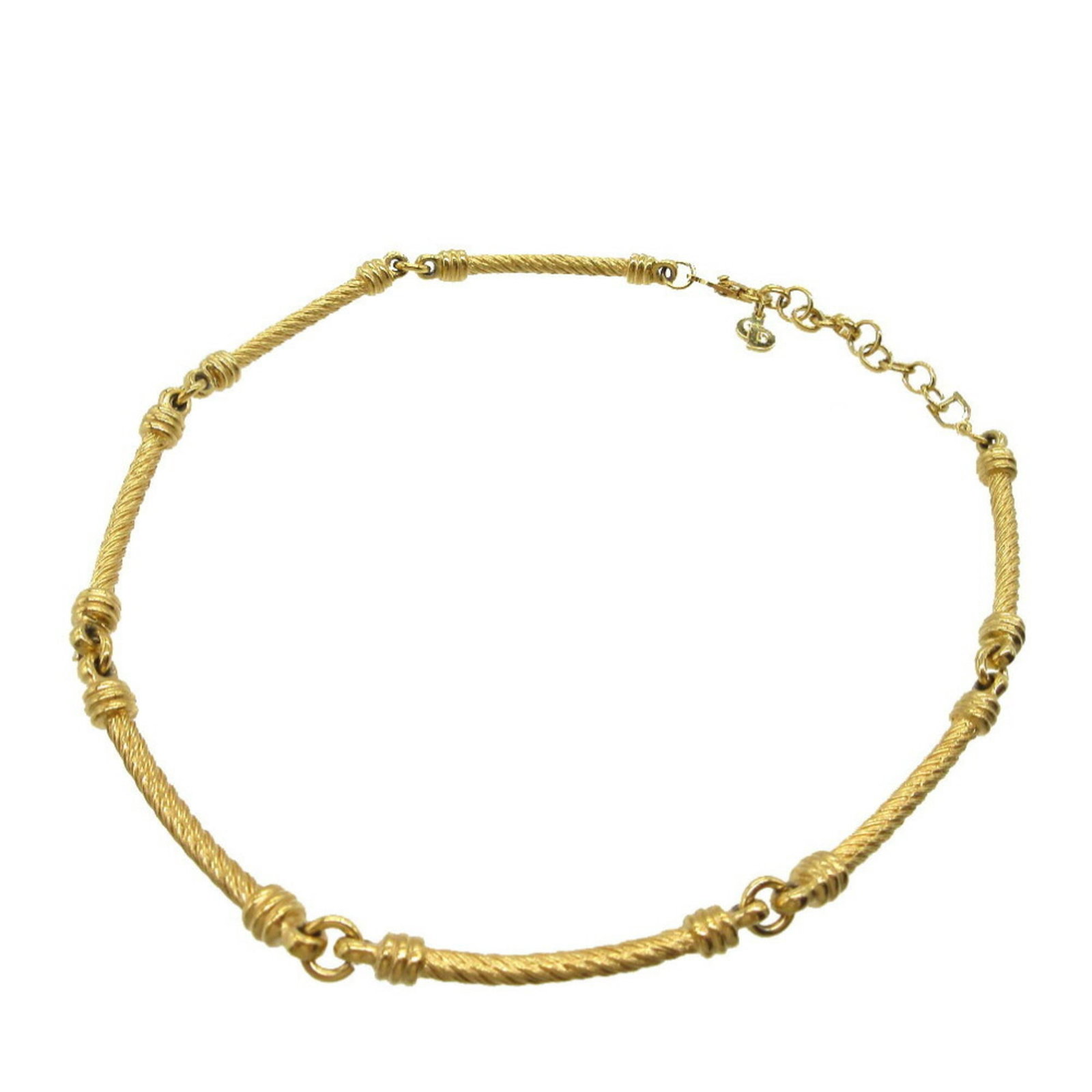 Christian Dior Choker Rope Necklace Metal Gold 1941Christian: Christian Dior Choker Rope Necklace Metal Gold 1941Christian Metal gold choker necklace with rope design, bearing the signature of Christian Dior. The 1941 date indicates its vintage origin. This