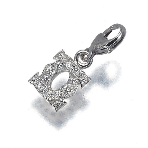 Diamond Pendant Entrelaces Baby Charm by Cartier 18k White: Diamond Pendant Entrelaces Baby Charm by Cartier 18k White Cartier's Entrelaces charm collection features a delicate diamond pendant, showcasing a natural diamond set in 18k white gold. The entwined d