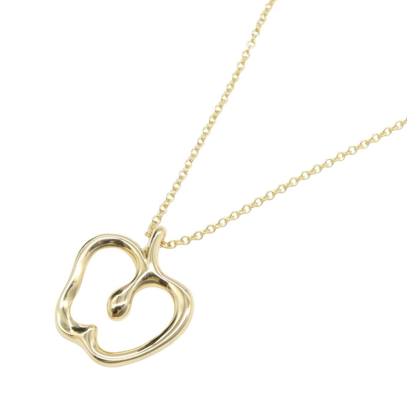 Women's Apple Necklace in 18K Yellow Gold by Tiffany: Women's Apple Necklace in 18K Yellow Gold by Tiffany 18K Yellow Gold Apple Necklace by Tiffany boasts a sleek, modern design with an 18mm x 16mm pendant set in a sturdy yellow gold chain. The necklace