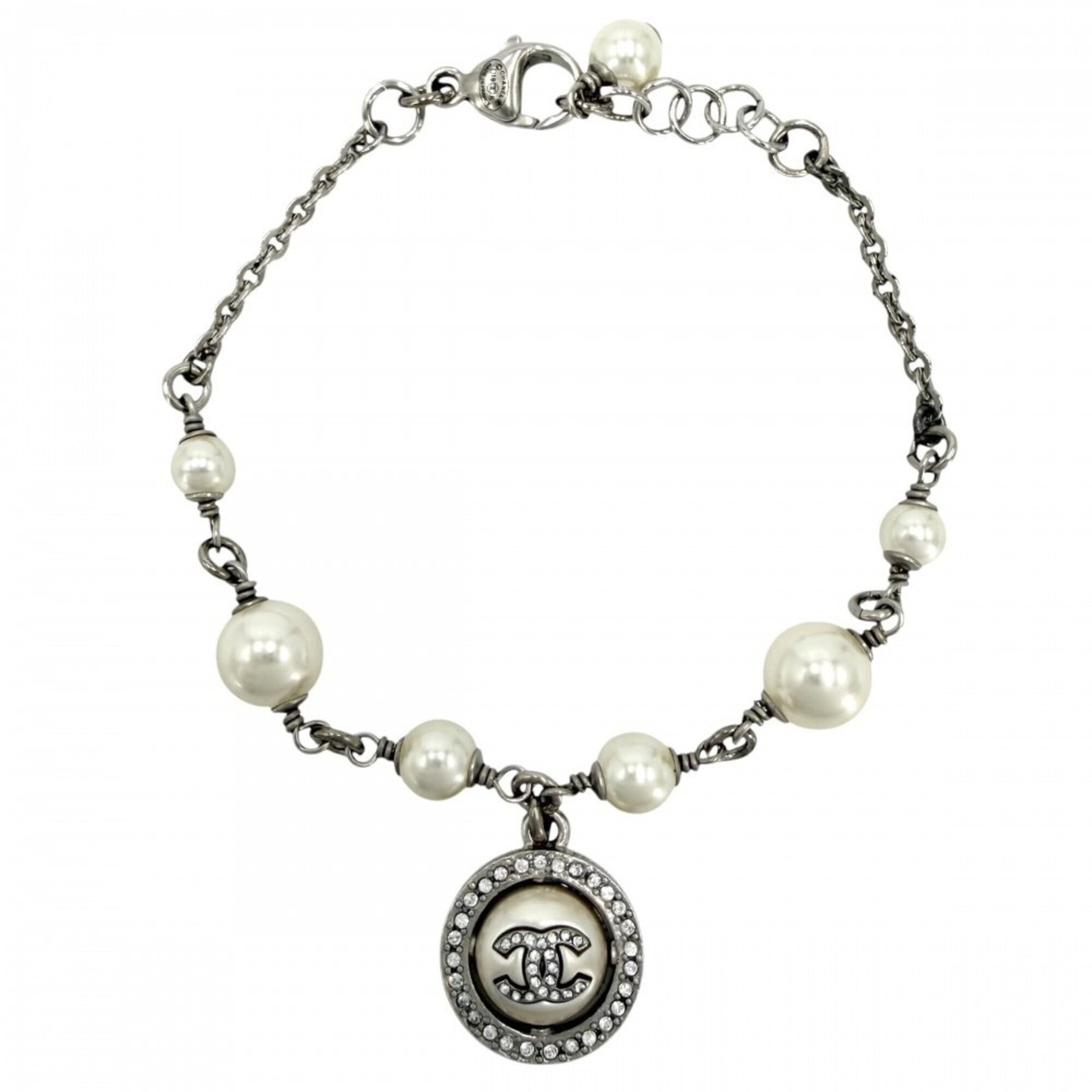 Chanel Charm Bracelet Artificial Pearl Rhinestone: Chanel Charm Bracelet Artificial Pearl Rhinestone Silver and white artificial pearl rhinestone details adorn this Chanel-inspired charm bracelet, adding a touch of luxury to any outfit. The adjustable