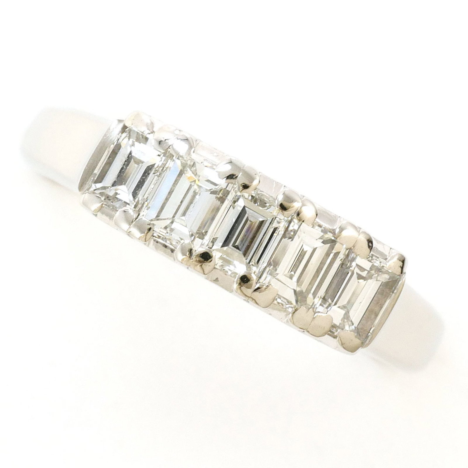 Unbranded Band Ring Platinum 900: Unbranded Band Ring Platinum 900 Platinum 900 band ring features a diamond stone weighing 0.81 carats, set in a platinum metal construction with a US size 6 fit and 5mm width. The ring's weight is