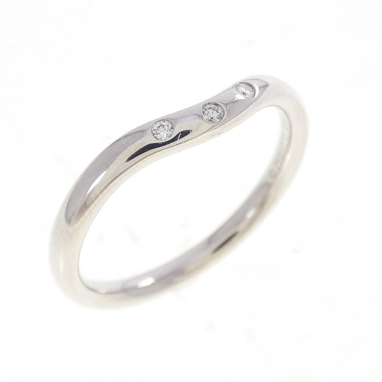 Tiffany Band Ring White Gold (18K): Tiffany Band Ring White Gold (18K) Tiffany Band Ring White Gold (18K) features a diamond stone and is made from 18K white gold, with a US size of 6.5. This band ring is crafted in the iconic Tiffany s