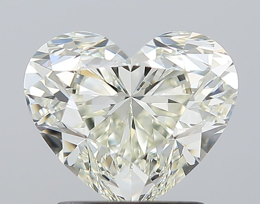 IGI Heart 1.7ct J VVS2 - Loose Natural Diamond: IGI Heart 1.7ct J VVS2 - Loose Natural Diamond 1.7ct IGI certified natural diamond with exceptional clarity and polish, boasting an impressive J color grade and EX symmetry. This loose gemstone featur