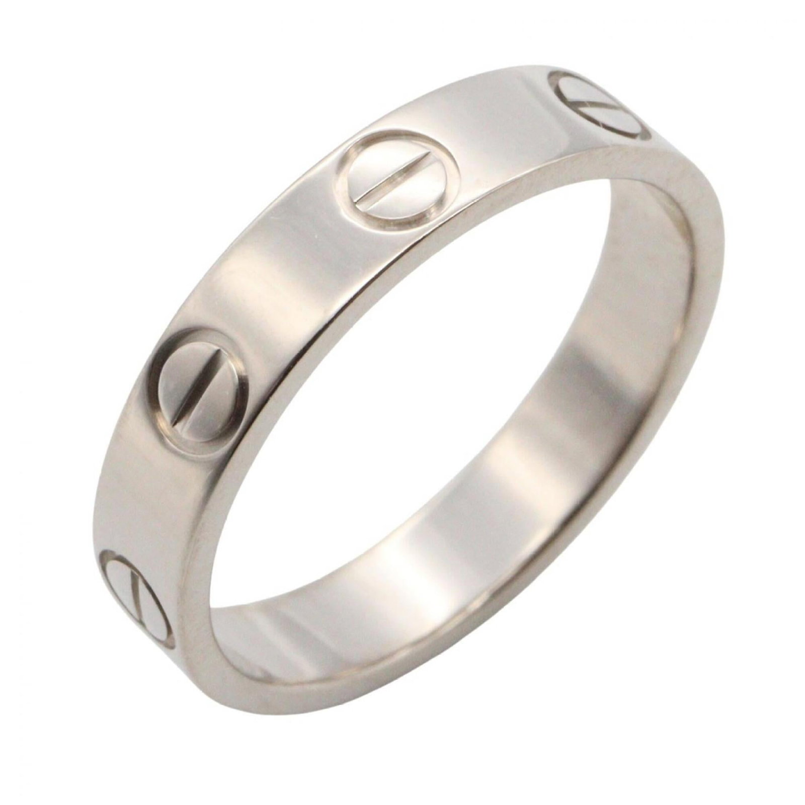 Cartier Band Ring White Gold (18K): Cartier Band Ring White Gold (18K) Cartier Band Ring White Gold (18K) features a sleek and sophisticated design, making it a stylish addition to any outfit. This 18K white gold band ring boasts a clas