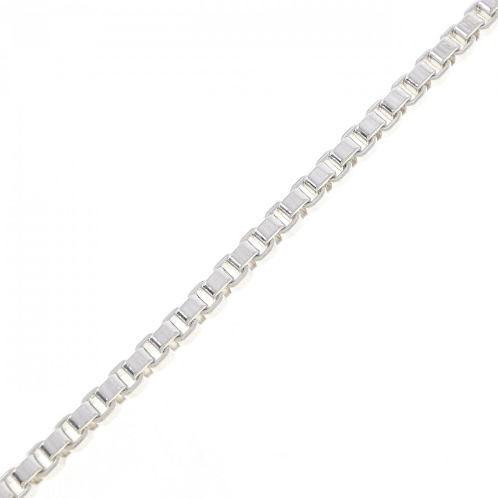 Tiffany Charm Bracelet Silver 925: Tiffany Charm Bracelet Silver 925 Silver 925 Tiffany Charm Bracelet, 19cm in length. This charm bracelet features the iconic Tiffany brand and is made from high-quality silver. Its sleek design makes