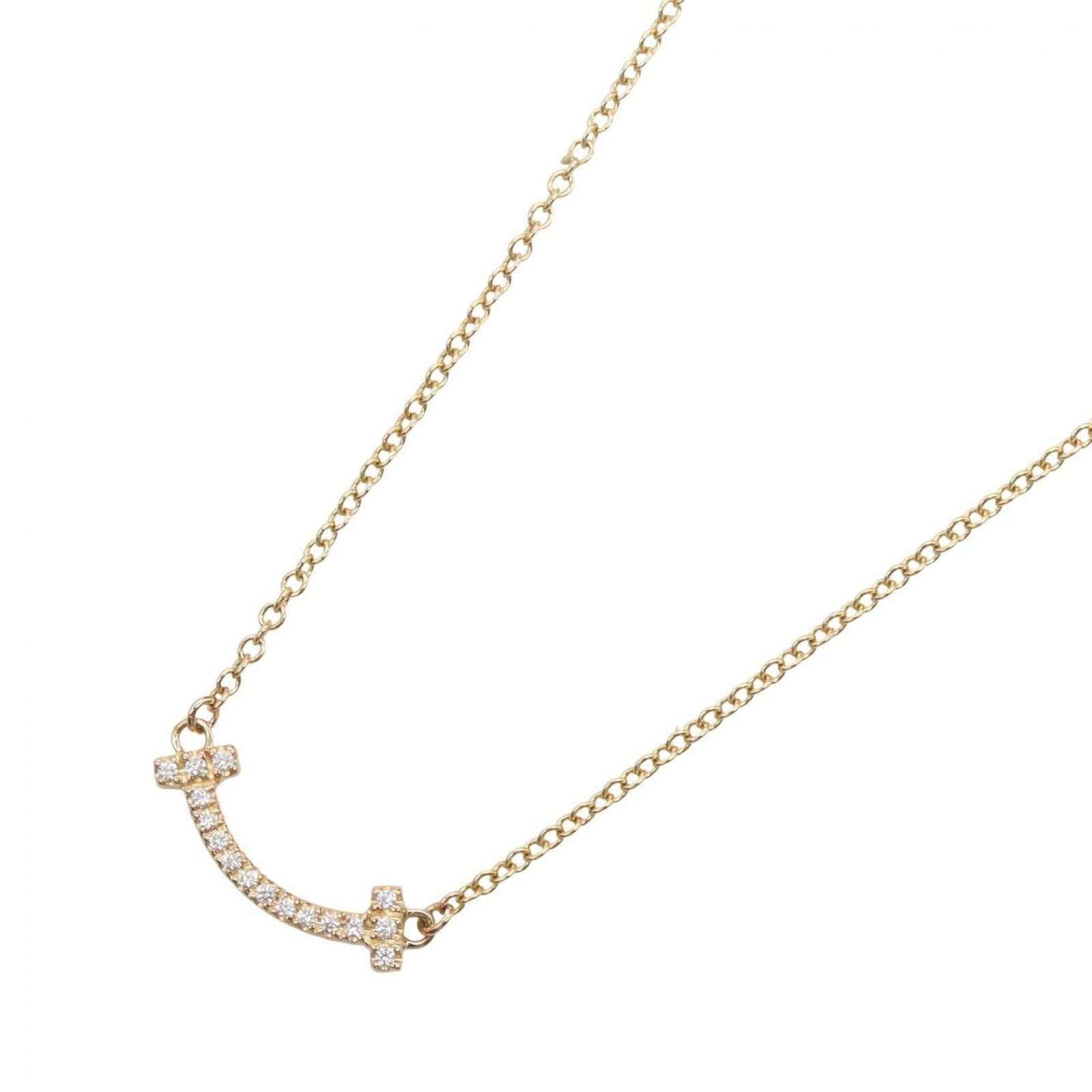 Tiffany & Co. T Smile Mini Diamond Necklace 18K Pink Gold (Pg) Diamond Women'S Tone Clear 62617683: Tiffany & Co. T Smile Mini Diamond Necklace 18K Pink Gold (Pg) Diamond Women'S Tone Clear 62617683 Tiffany & Co.'s T Smile Mini Diamond Necklace shines in 18K pink gold, featuring a clear diamond pend