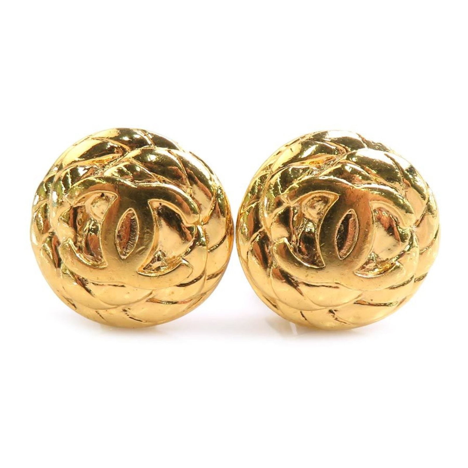 Metal clip earrings by Chanel: Metal clip earrings by Chanel Metal clip earrings by Chanel, crafted from gold metal in France. These stylish earrings feature the iconic Chanel design, showcasing the brand's signature elegance and s