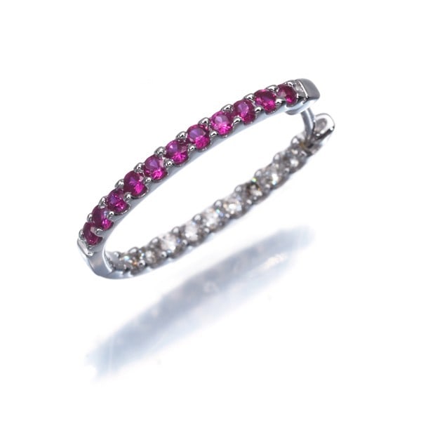 Ruby .0.15Ct Diamond 0.07Ct Hoop Single Earring 18K 750 White Gold: Ruby .0.15Ct Diamond 0.07Ct Hoop Single Earring 18K 750 White Gold This elegant single earring boasts a stunning ruby centerpiece, set in a sleek 18k white gold hoop design. The accompanying diamond a