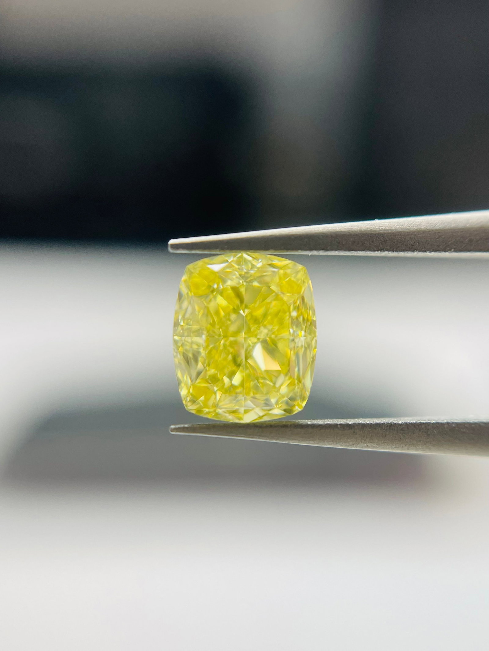 GIA Cushion Modified 0.66ct Fancy Yellow VVS1 - Loose Natural Diamond: GIA Cushion Modified 0.66ct Fancy Yellow VVS1 - Loose Natural Diamond GIA certified, this 0.66ct Fancy Yellow VVS1 diamond boasts exceptional clarity and color, with an EX polish that showcases its