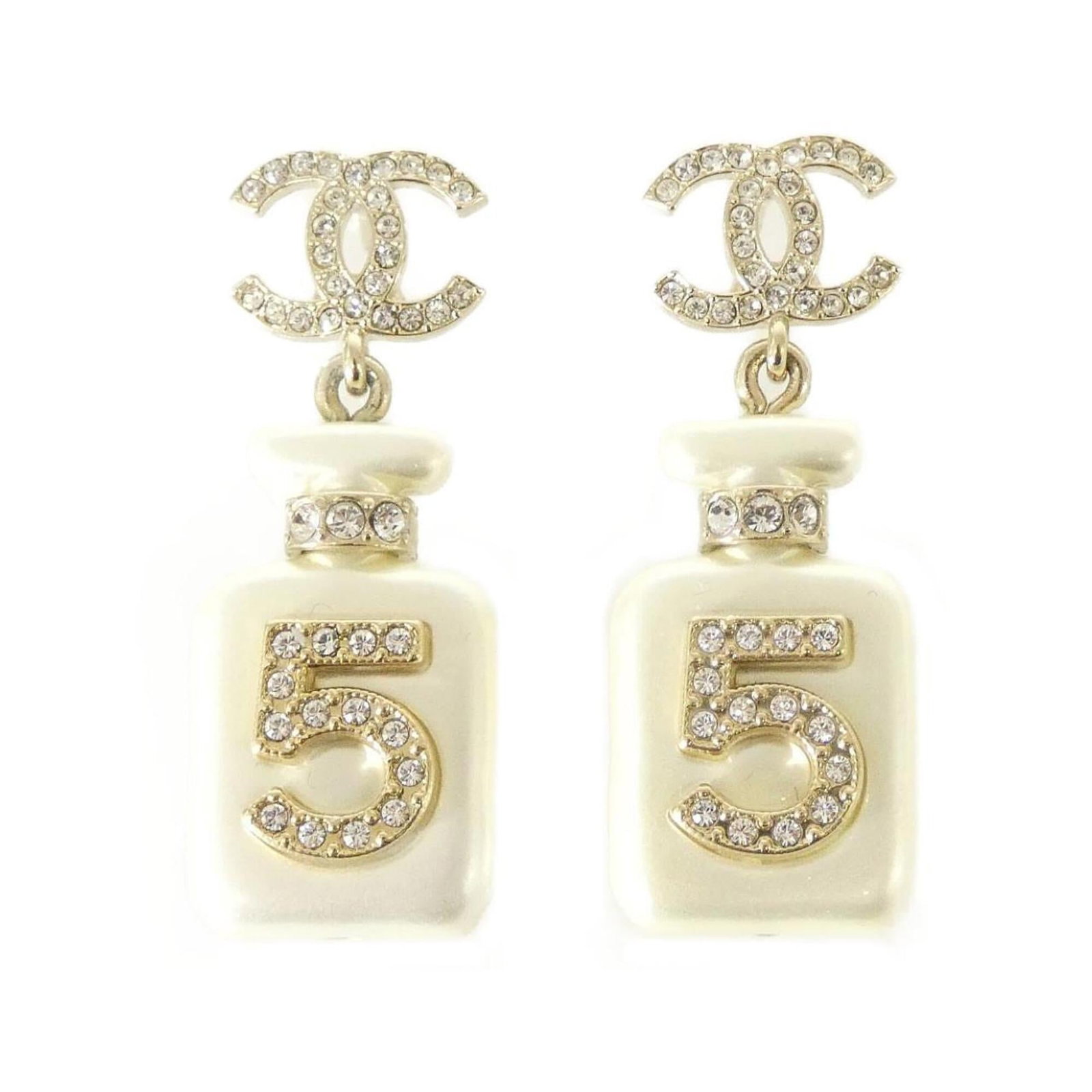 Chanel Drop Earrings: Chanel Drop Earrings Black, Gold, and White Crystal Drop Earrings from Chanel. The earrings measure 38mm x 15mm with a 1.50'' x 0.59'' width and depth. They feature crystal stones in a sleek drop desi