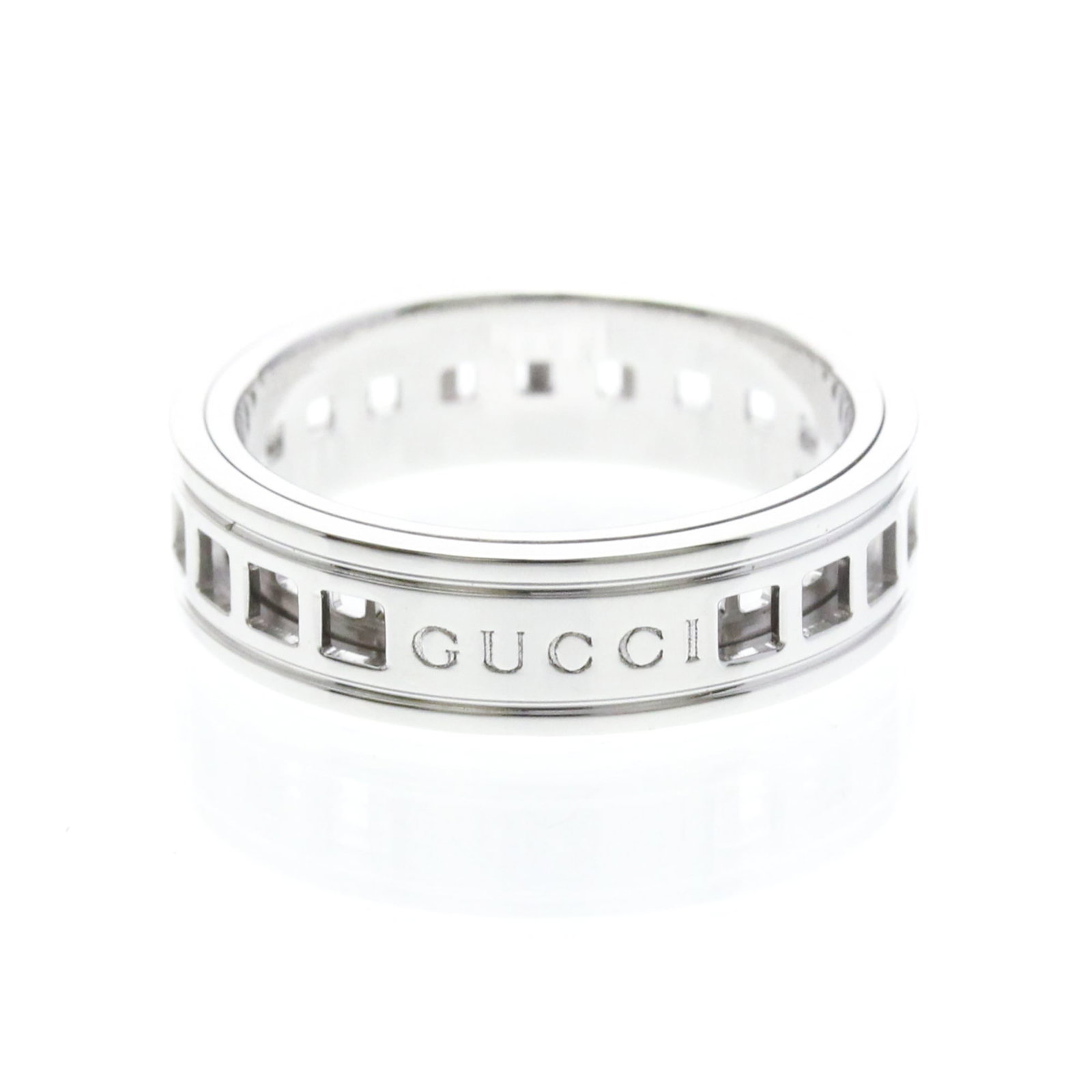White Gold 18k Ring By Gucci: White Gold 18k Ring By Gucci White Gold 18k Ring By Gucci features a sleek scroll design, crafted from high-quality white gold (18K) metal. This fashion band ring boasts a slender width of 5.4mm and