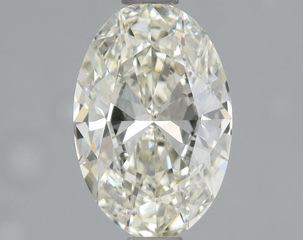 GIA Oval 0.91ct K VVS1 - Loose Natural Diamond: GIA Oval 0.91ct K VVS1 - Loose Natural Diamond 0.91ct K VVS1 - Loose Natural Diamond with Excellent Cut, High Clarity, and Exceptional Polish. This GIA-certified oval diamond boasts a vibrant color gr