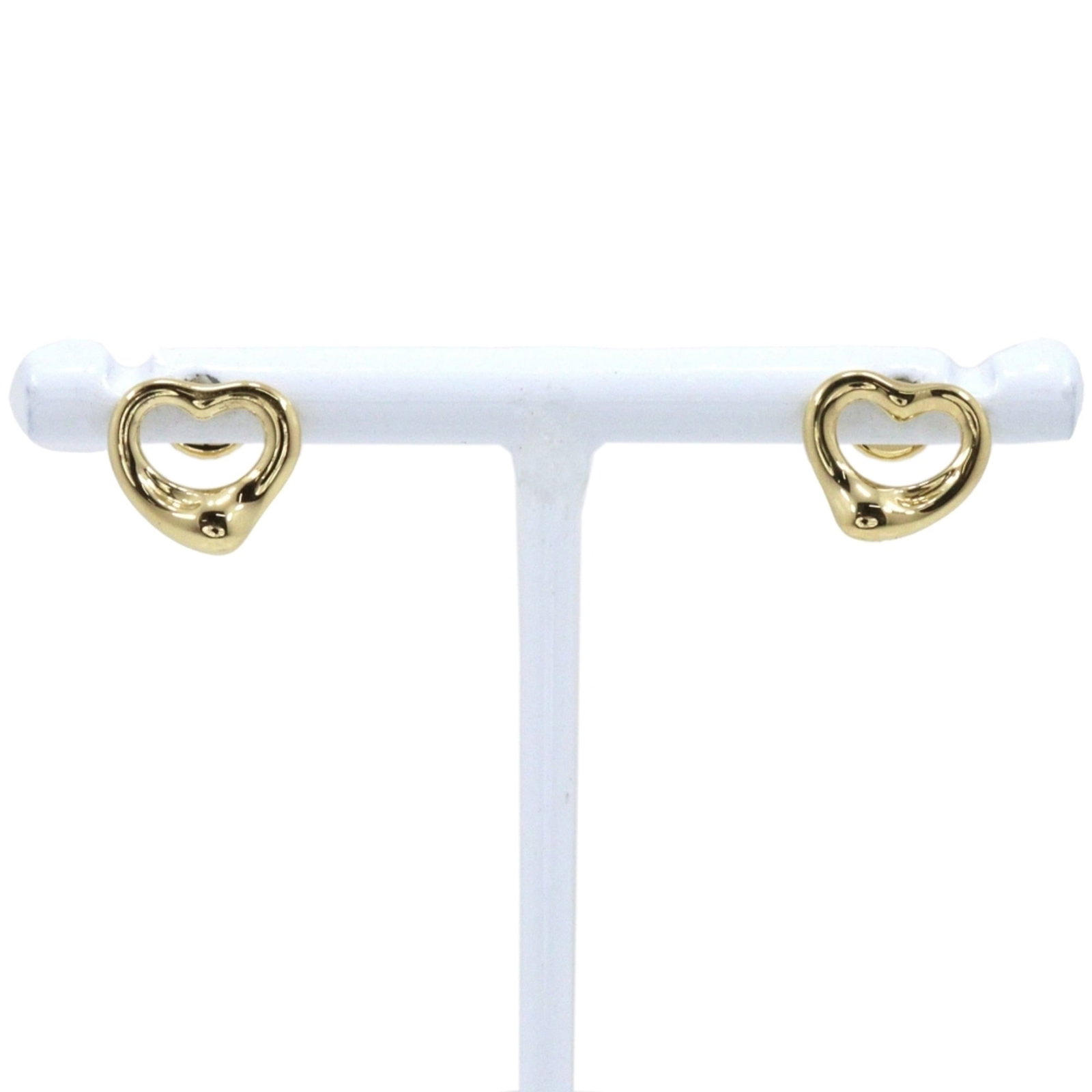 Tiffany Stud Earrings Yellow Gold (18K): Tiffany Stud Earrings Yellow Gold (18K) Yellow gold (18K) Tiffany stud earrings with a classic open heart design, crafted to add a touch of timeless elegance to any outfit. Weighing in at 3g, these