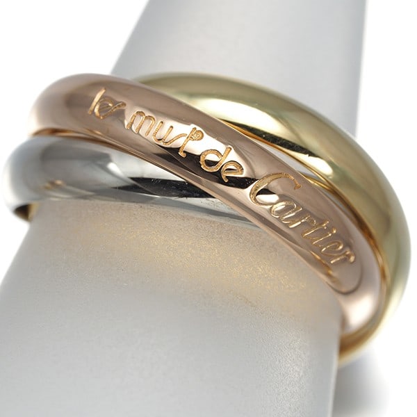 Cartier Ring Trinity 3Color Classic Eu53 18K 750 Yellow White Rose Gold: Cartier Ring Trinity 3Color Classic Eu53 18K 750 Yellow White Rose Gold Cartier's iconic Trinity ring, a masterful blend of three-tone gold, features a sleek design with a subtle rose gold, white gold