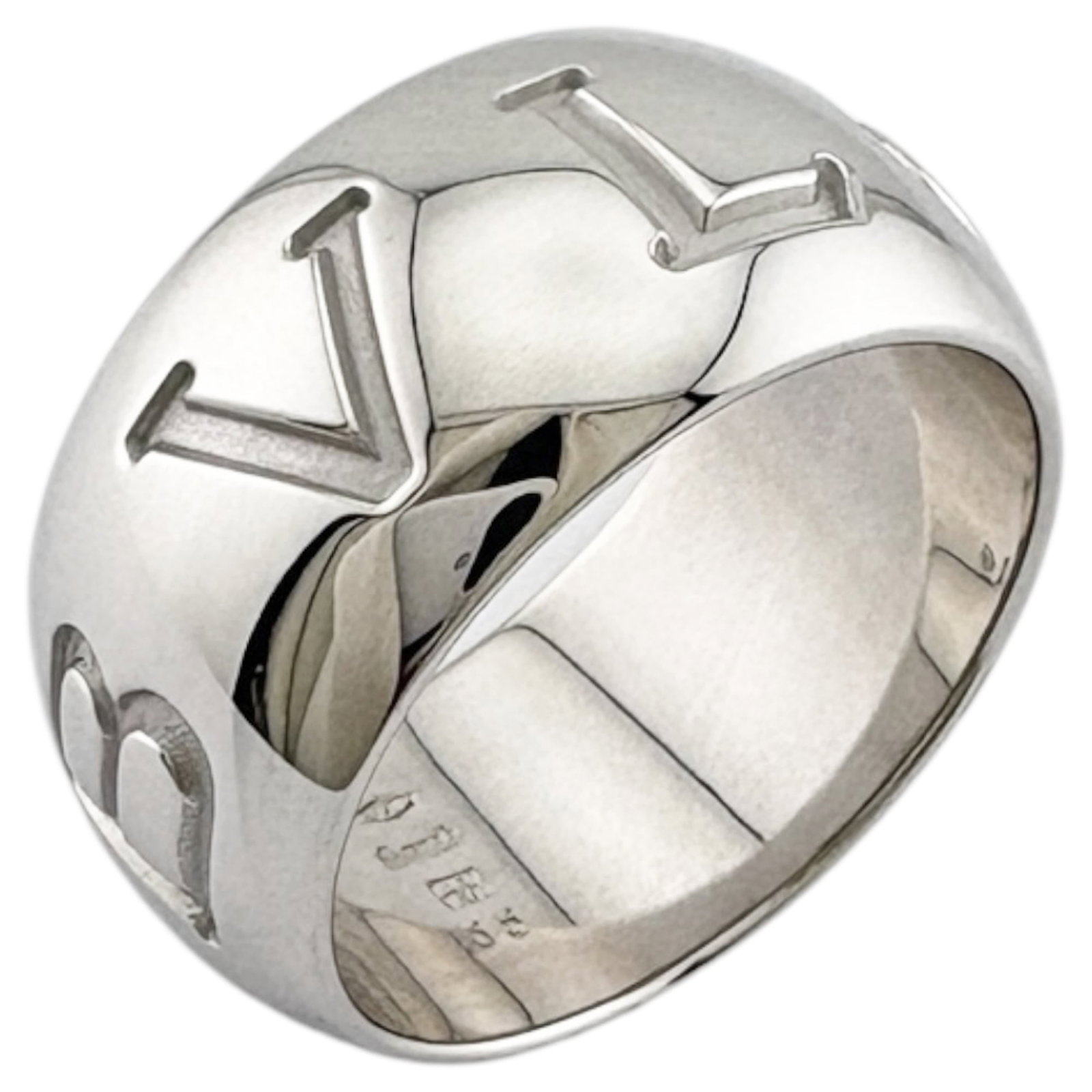 White Gold Bvlgari Ring Band: White Gold Bvlgari Ring Band White gold (18K) band ring from Bvlgari, available in US size 7. This elegant silver ring features the iconic Italian luxury brand's signature style and craftsmanship. Mad