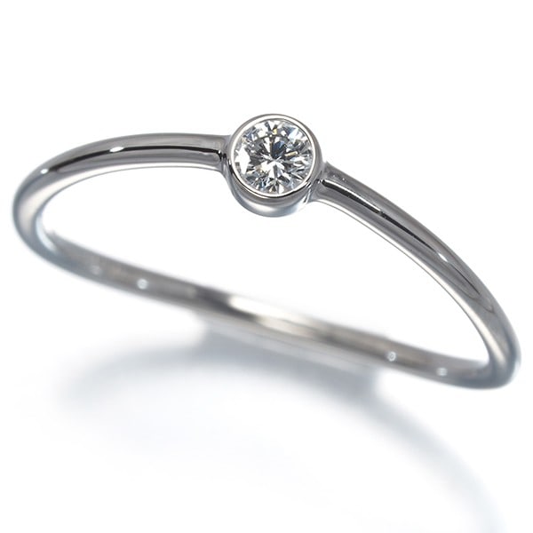 Tiffany&Co. Ring Diamond Wavesingle-Row Us5.25-5.5 950 Platinum: Tiffany&Co. Ring Diamond Wavesingle-Row Us5.25-5.5 950 Platinum Tiffany & Co.'s Wave ring showcases a stunning single-row diamond design set in platinum, with a natural metal purity of 950. The 1.4g p