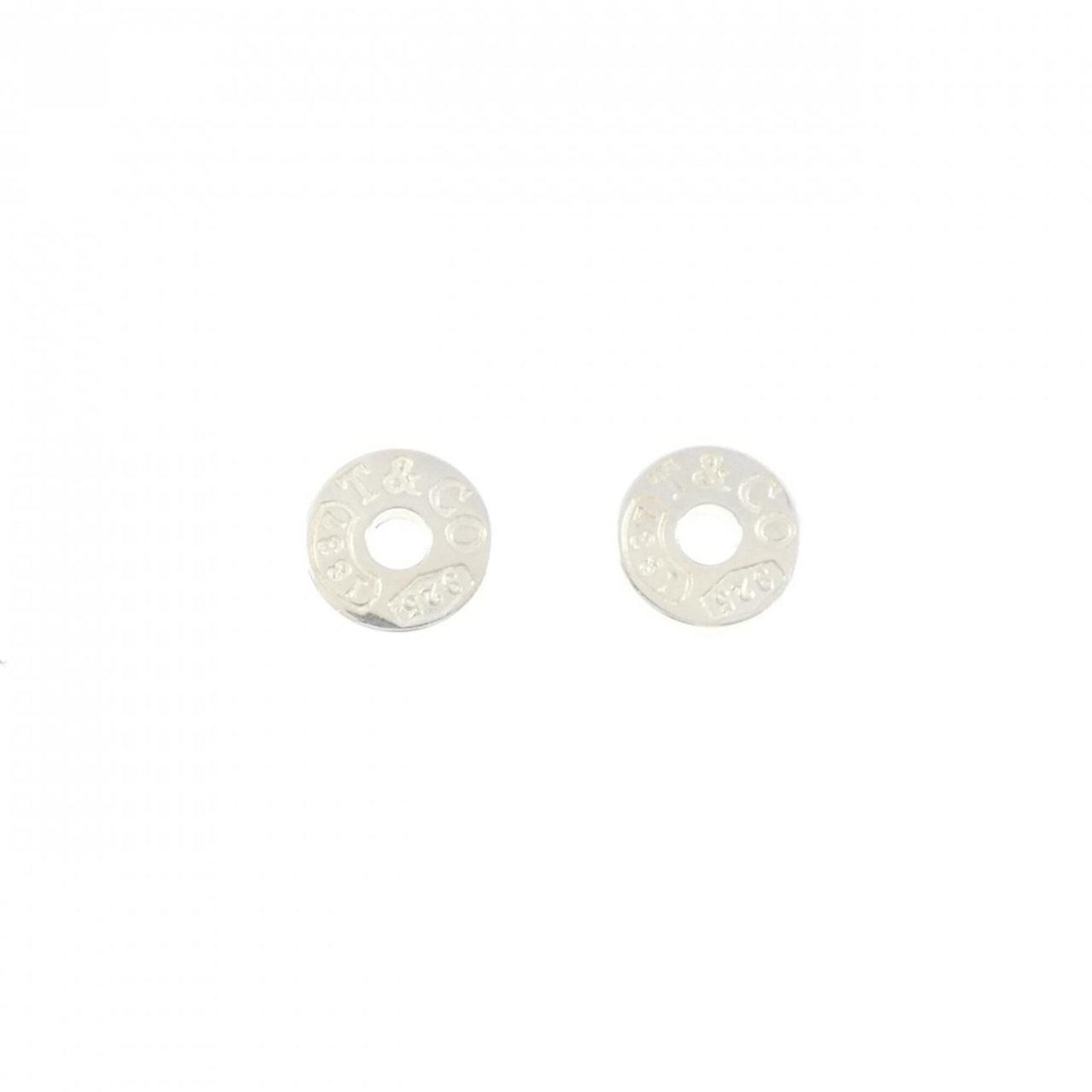 Tiffany Stud Earrings Silver 925: Tiffany Stud Earrings Silver 925 Silver 925 Tiffany stud earrings with a classic design, bearing the signature of the renowned brand. Made from high-quality sterling silver, these elegant earrings are