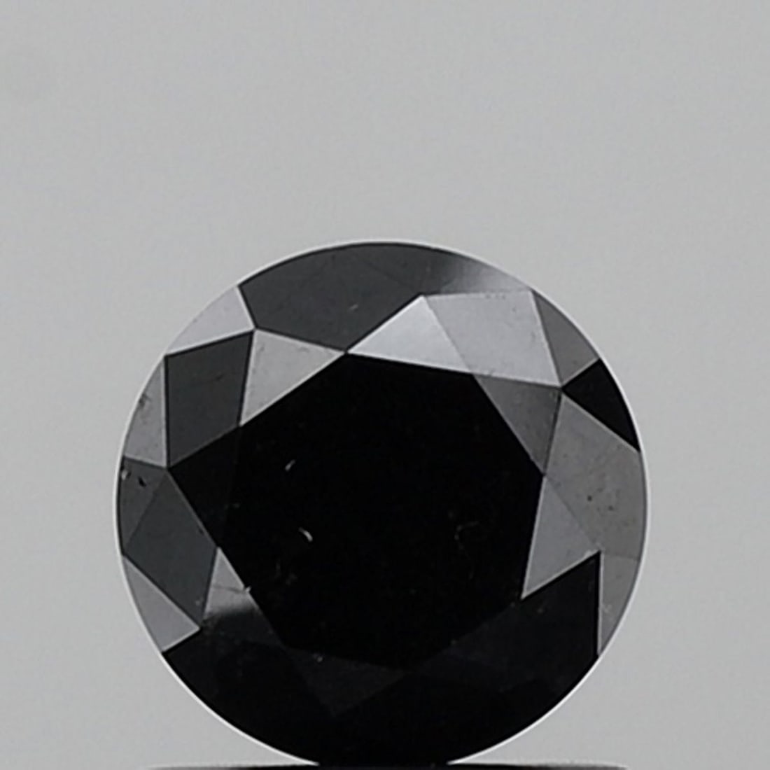 Round 1.19ct Fancy Black VVS2 - Loose Natural Diamond: Round 1.19ct Fancy Black VVS2 - Loose Natural Diamond The 1.19ct Fancy Black VVS2 diamond boasts exceptional clarity and color, with its EX polish and symmetry making it a standout among loose diamond