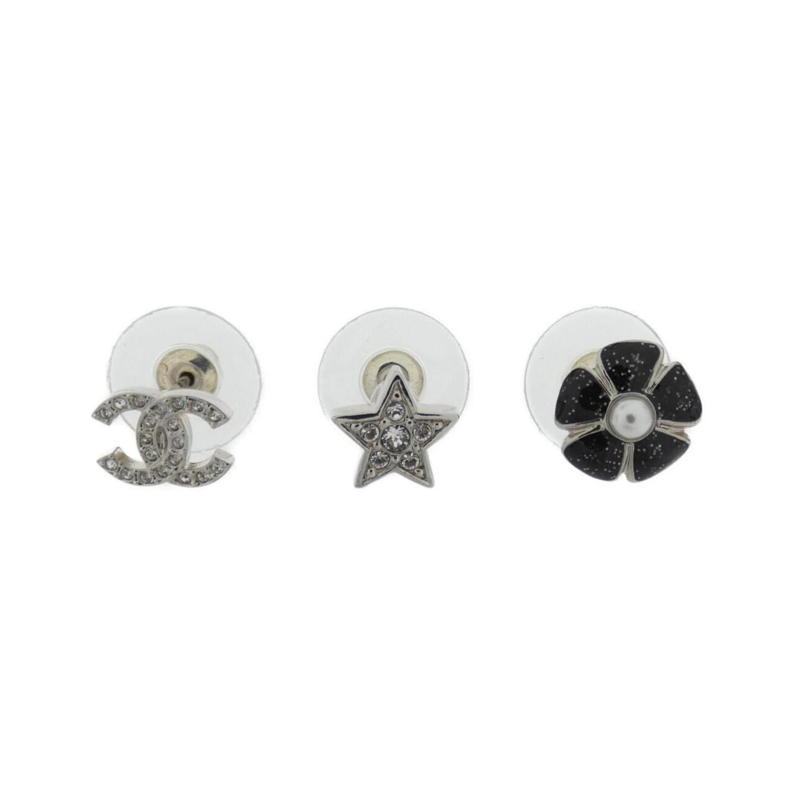 Chanel stud earrings: Chanel stud earrings Stud earrings in black, silver, and white from the iconic Chanel brand, featuring a sleek design with precise dimensions at 8.00mm x 10.00mm. Made with a sturdy material, these ea