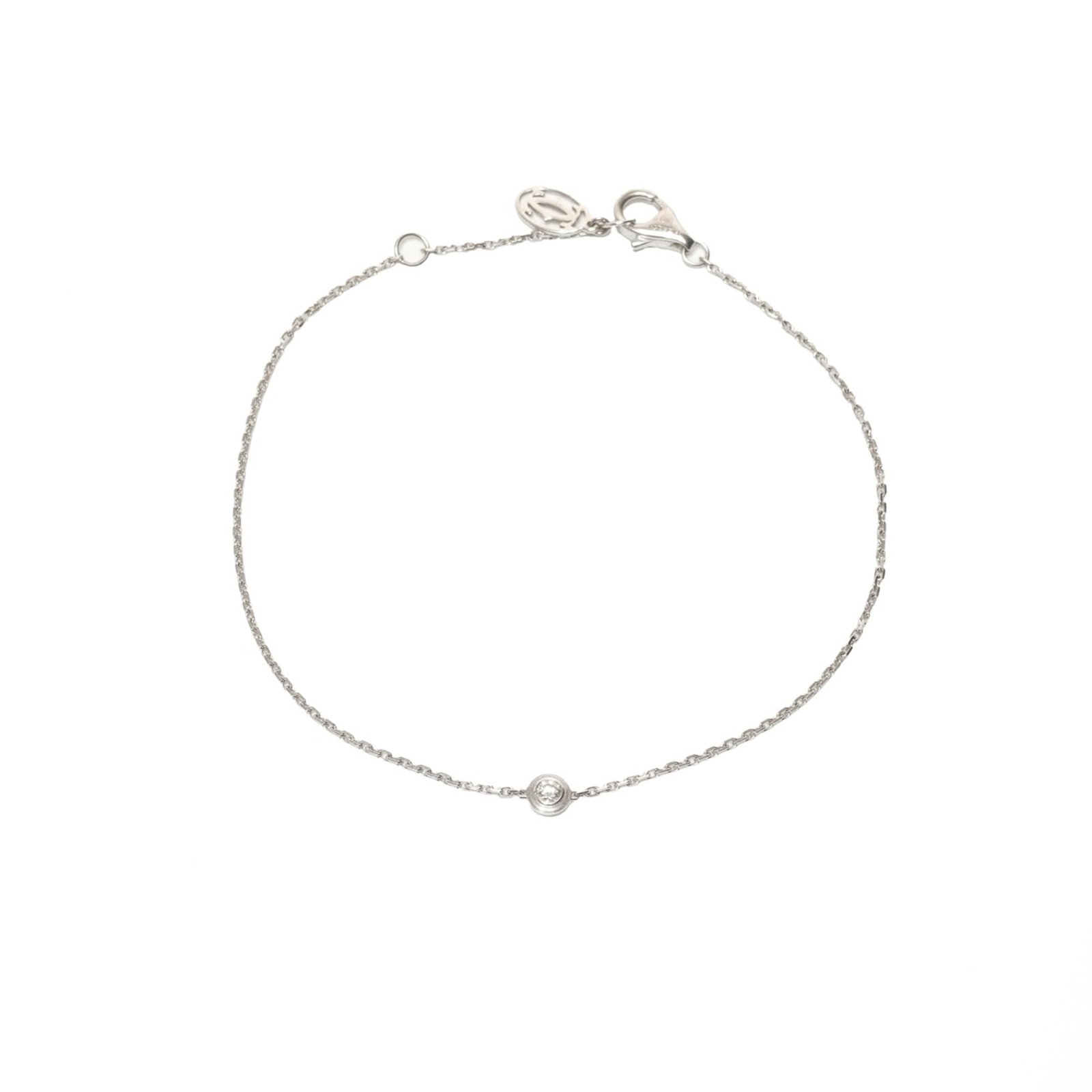 Charm Cartier Bracelet White Gold 18K: Charm Cartier Bracelet White Gold 18K Cartier's iconic charm bracelet in white gold 18K adds a touch of elegance to any outfit. This sterling silver-toned piece boasts a sleek design and measures 7.08