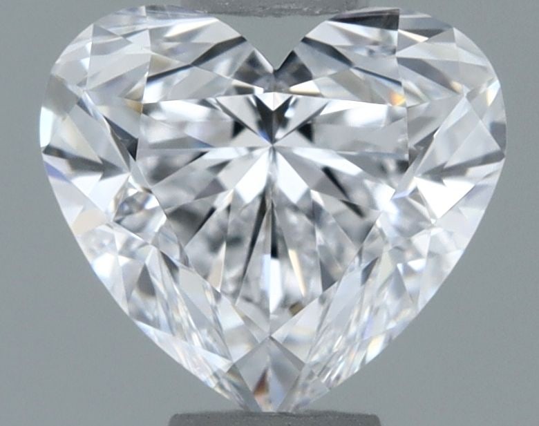 GIA Heart 0.71ct D VVS2 - Loose Natural Diamond: GIA Heart 0.71ct D VVS2 - Loose Natural Diamond GIA certifies this 0.71ct D VVS2 diamond, showcasing exceptional clarity and color. The EX polish and symmetry highlight its natural beauty, making it