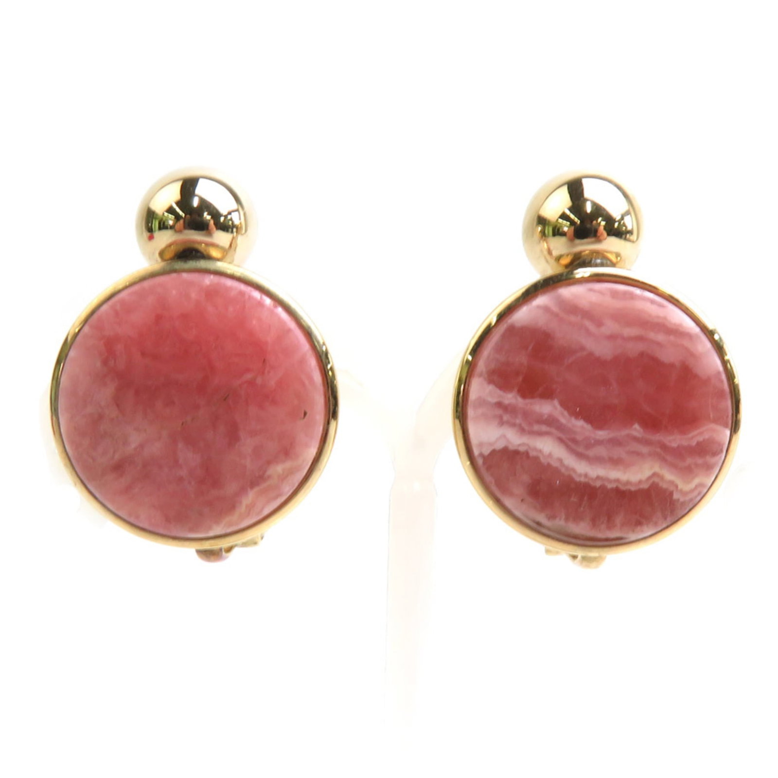 Clip earrings in metal by Christian Dior: Clip earrings in metal by Christian Dior Clip earrings in gold and pink metal by Christian Dior, featuring a sleek and modern design. Made from high-quality metal, these clip earrings showcase the ico