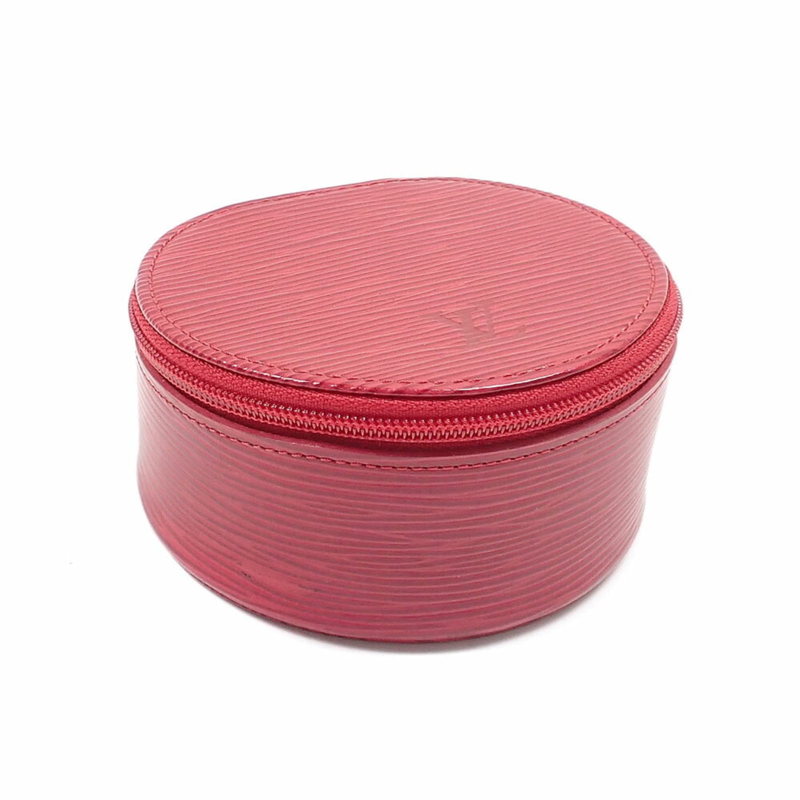 Epi leather Louis Vuitton jewelry case: Epi leather Louis Vuitton jewelry case Castilian red Epi leather wraps around the Louis Vuitton jewelry case, adding a pop of vibrant color to any accessory. The compact size makes it perfect for