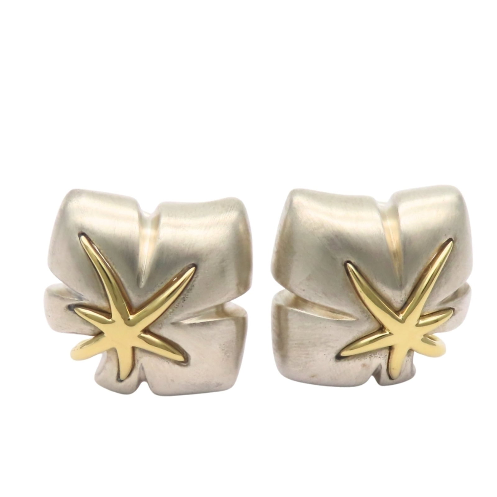 Tiffany clip earrings silver yellow gold 925 18k: Tiffany clip earrings silver yellow gold 925 18k Tiffany clip earrings in silver and yellow gold, featuring the iconic brand's signature style. Made from high-quality materials, including sterling