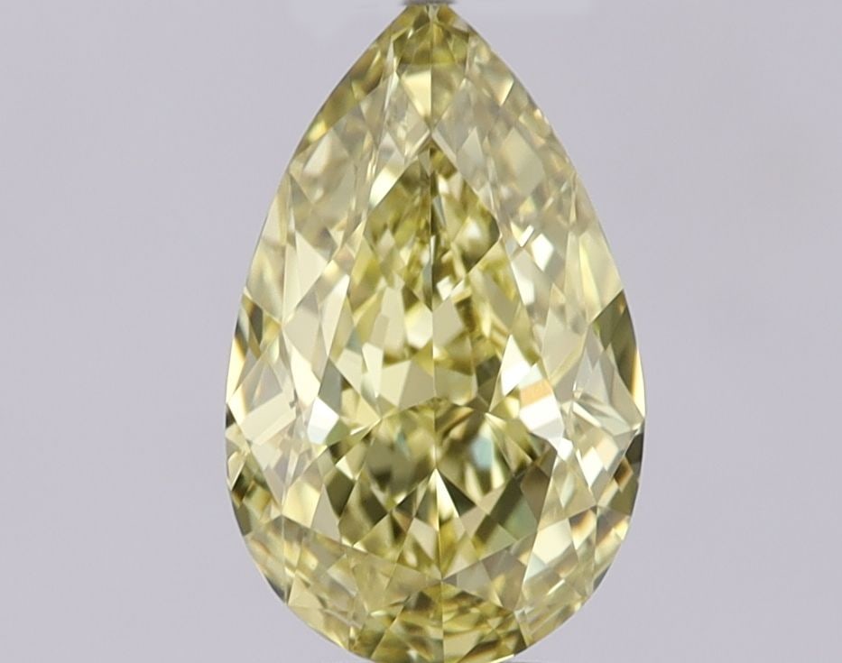 GIA Pear 0.74ct Fancy Intense Yellow VVS2 - Loose Natural Diamond: GIA Pear 0.74ct Fancy Intense Yellow VVS2 - Loose Natural Diamond GIA-certified Fancy Intense Yellow VVS2 diamond with EX polish and VG symmetry, showcasing exceptional clarity and color. This 0.74ct