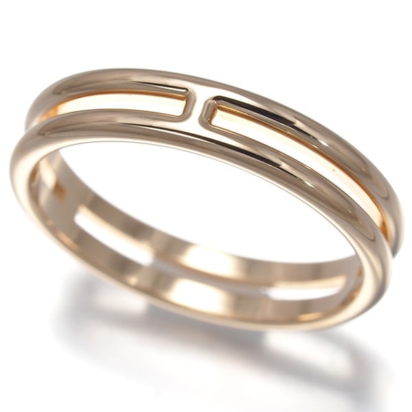 Hermes Ring Ariane Eu51 18K 750 Rose Gold: Hermes Ring Ariane Eu51 18K 750 Rose Gold 18K rose gold Ariane ring in EU51 size, featuring a classic design with a subtle charm. This elegant ring boasts a 3.8mm wide band and weighs 3.0g, making it