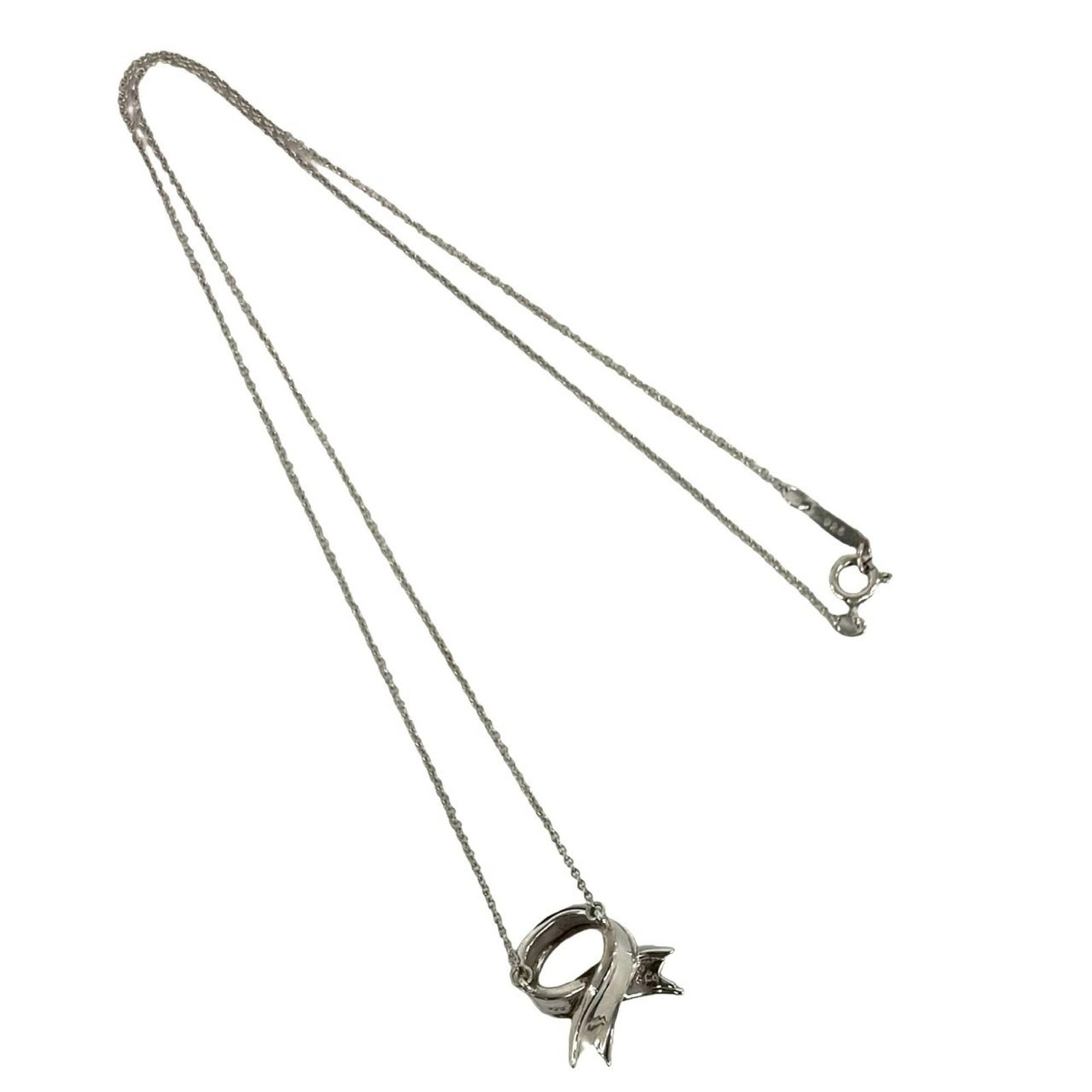 Tiffany&Co. Tiffany Vintage Cross Ribbon Necklace Sterling Silver 925 Pendant 40105: Tiffany&Co. Tiffany Vintage Cross Ribbon Necklace Sterling Silver 925 Pendant 40105 Tiffany&Co.'s vintage cross ribbon necklace boasts a striking sterling silver design, featuring a 15mm x 15mm