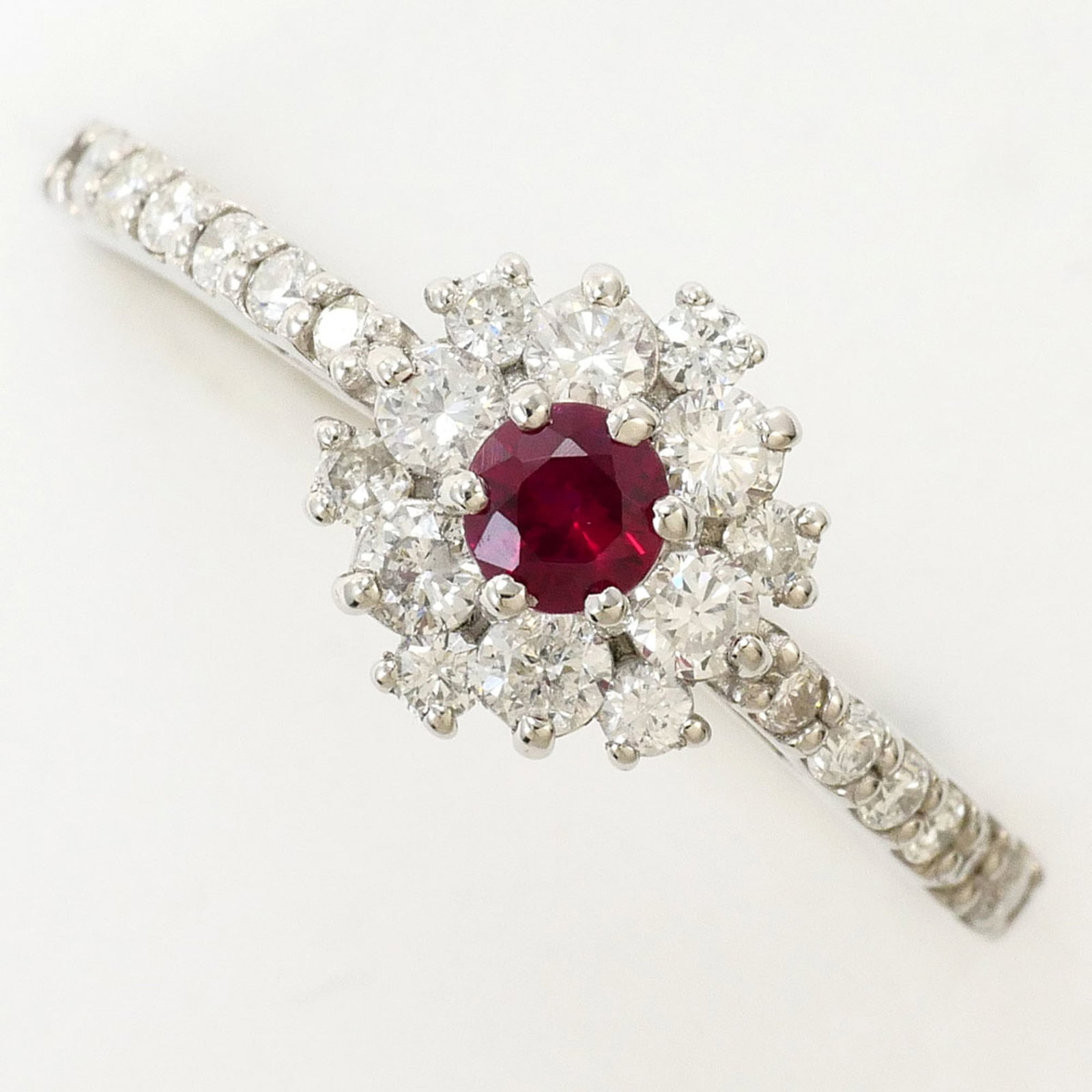 Unbranded band ring platinum 950: Unbranded band ring platinum 950 Platinum 950 band ring features a diamond and ruby stone, set in an unbranded platinum band with a US size 7 fit. The ring measures 8mm wide and weighs 2.9g. Its
