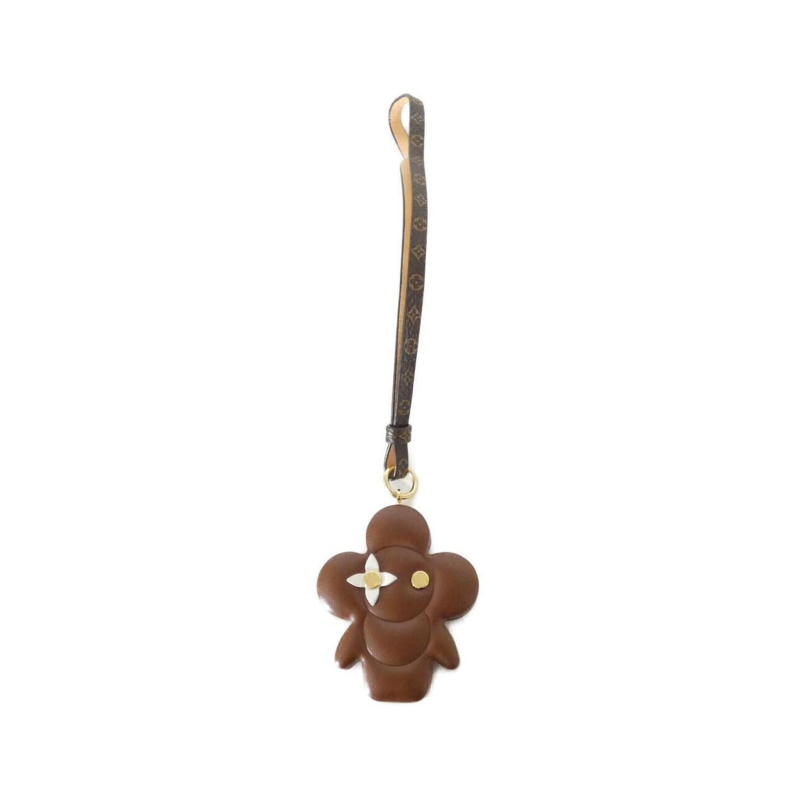 Canvas leather handbag charm by Louis Vuitton: Canvas leather handbag charm by Louis Vuitton Canvas leather handbag charm by Louis Vuitton, featuring calf leather and a gold finish. This elegant accessory measures 60mm x 50mm and bears a