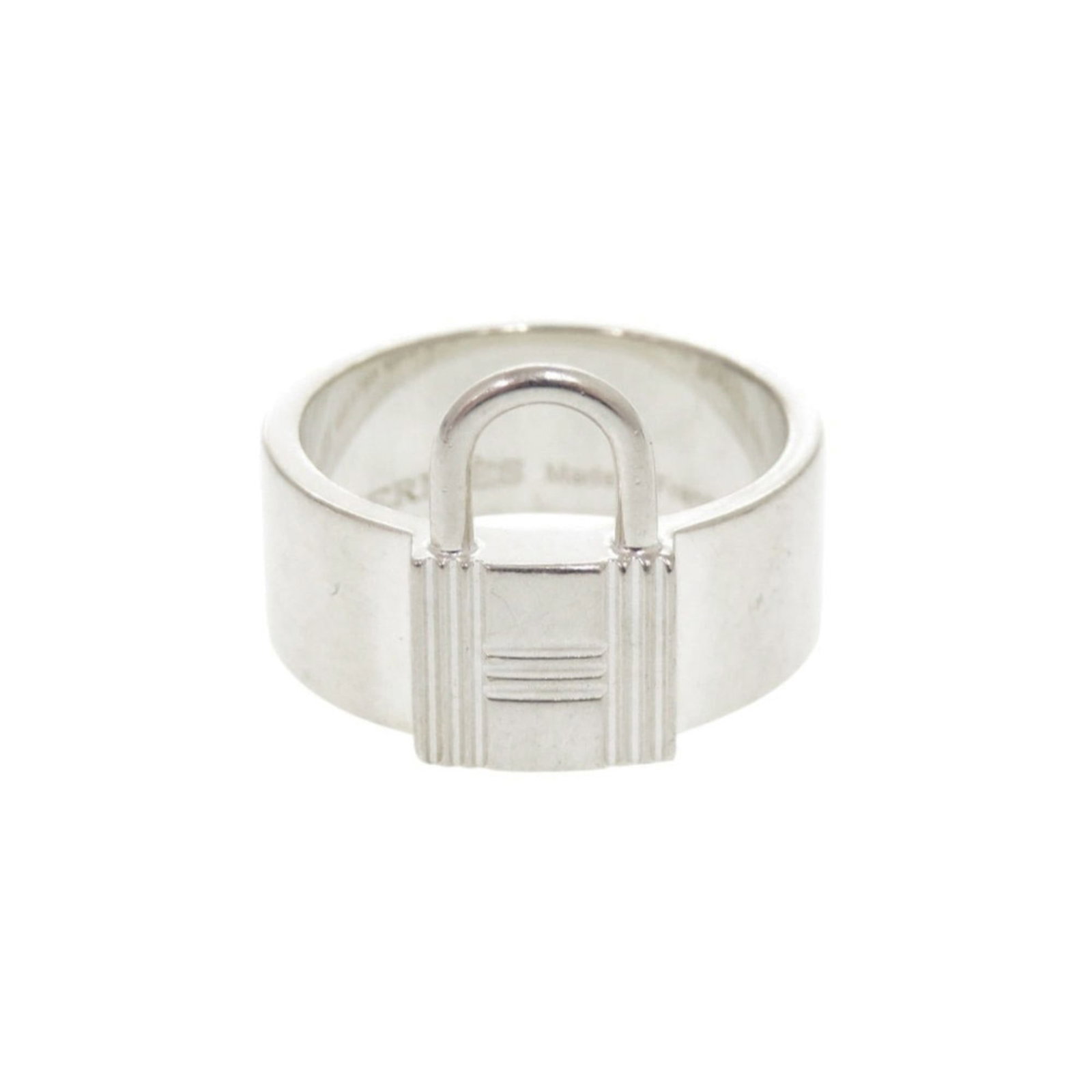 Ring of Silver Band by Hermes: Ring of Silver Band by Hermes Silver Band Ring by Hermes, crafted from high-quality silver (925), features a sleek and sophisticated design. This elegant band ring is available in size 7 US and made