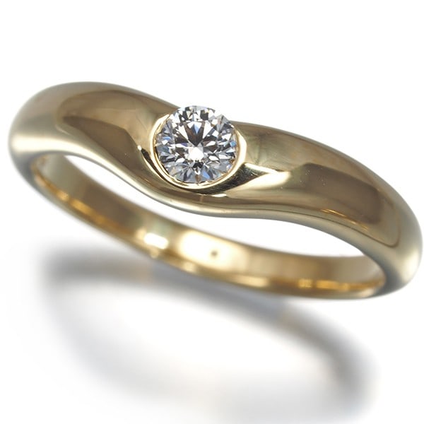 Tiffany&Co. Ring Diamond Curved Band Us6-6.25 18K 750 Yellow Gold: Tiffany&Co. Ring Diamond Curved Band Us6-6.25 18K 750 Yellow Gold Tiffany & Co.'s Curved Band Ring showcases a natural diamond set in an 18k yellow gold band, measuring approximately 3.5mm in diameter