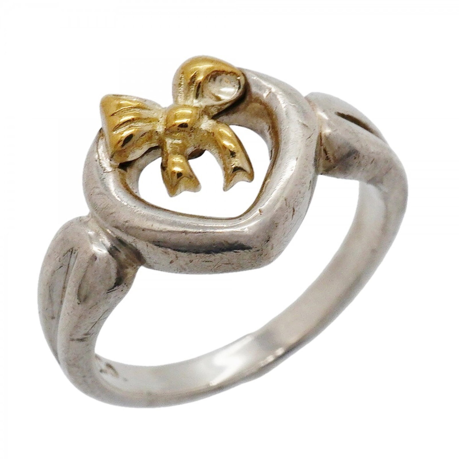 Tiffany Band Ring Silver 925 Yellow Gold (18K): Tiffany Band Ring Silver 925 Yellow Gold (18K) Item Specifics: Brand: Tiffany Type: Band ring Gender: Women Material: Silver 925, Yellow gold (18K) US Size: 4.5 Product Disclaimer: Items may exhibit