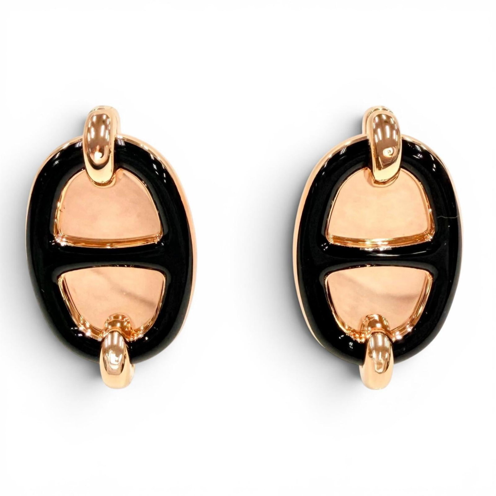 Hermes earrings stud: Hermes earrings stud Stud earrings from the renowned French luxury brand Hermes, crafted in rose gold and featuring a sleek black finish. Measuring 22mm x 13mm, these elegant earrings are designed to 